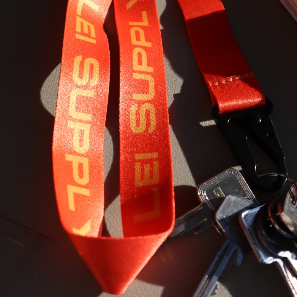 
                  
                    Lei Supply Lanyard Orange - Schlüsselband mit Logo - Lei Supply
                  
                